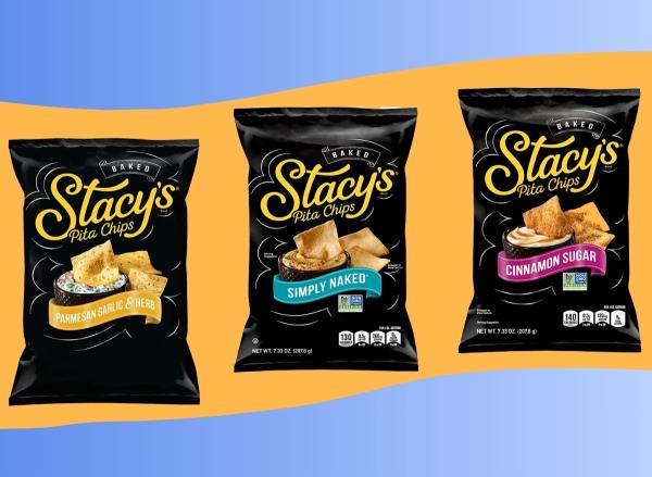 Stacy's Tomato & Basil pita chips on a plate with hummus next to a bag of the pita chips