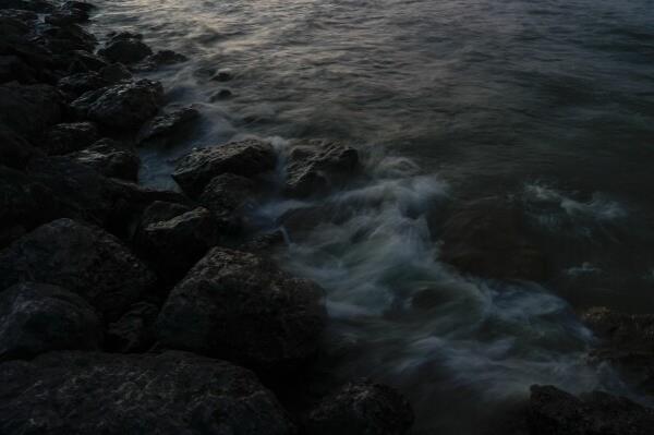 Waves crash against rocks along the Lake Erie shore, Wednesday, Sept. 4, 2024, at Maumee Bay State Park in Oregon, Ohio. (AP Photo/Joshua A. Bickel)