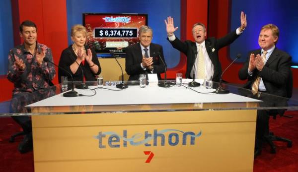 Jeff Newman reacts as the final total for Telethon 2009 is called out, moments after a $1m do<em></em>nation by Seven & WA News Chairman, Kerry Stokes. From left, Rick Ardon, Susanah Carr and Ray Waldrop right.