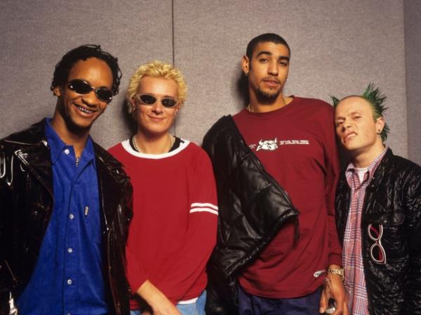 The Prodigy members Maxim, Liam Howlett, Leeroy Thornhill and Keith Flint posing for promotio<em></em>nal photos in 1995