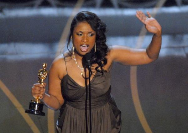Jennifer Hudson accepts an award at the 79th Annual Academy Awards