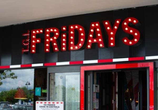 Exterior storefront view of TGI Fridays at the Two Rivers Shopping Mall in Staines, Surrey
