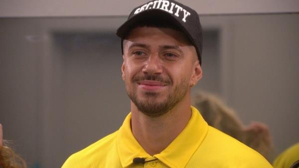 Big Brother's Marcello in a hat