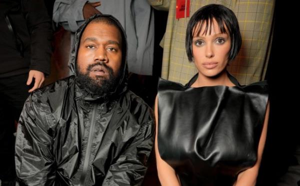 Kanye West and Bianca Censori dressed in all black at a party