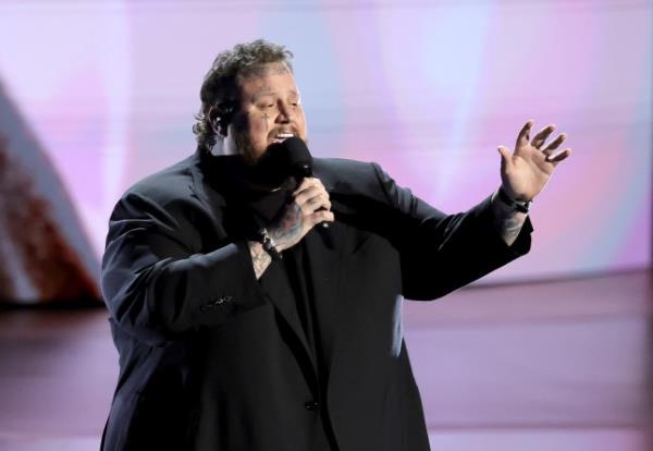 Jelly Roll singing on stage