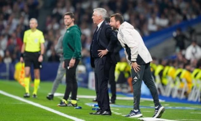 Carlo Ancelotti looks on during Real Madrid’s home defeat against Milan