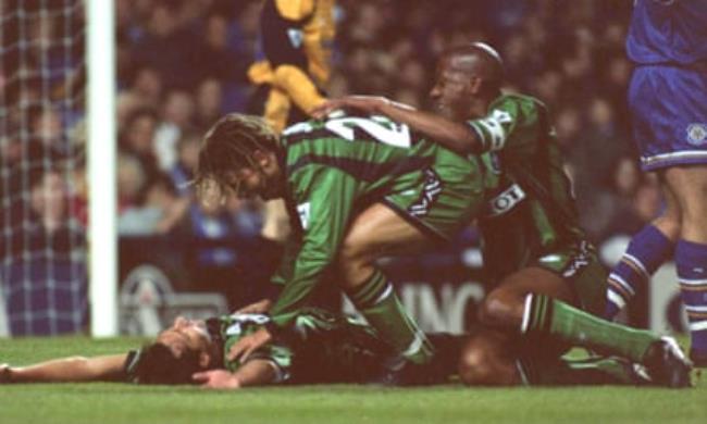 Coventry players co<em></em>ngratulate Roy Wegerle on his goal against Leicester.