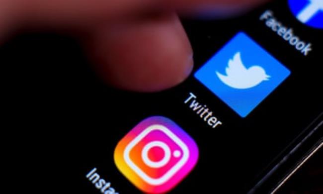 Twitter and Instagram apps on a screen.
