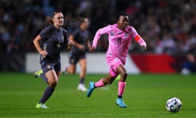 Christinah Kgatlana breaks clear of Georgia Stanway to score.