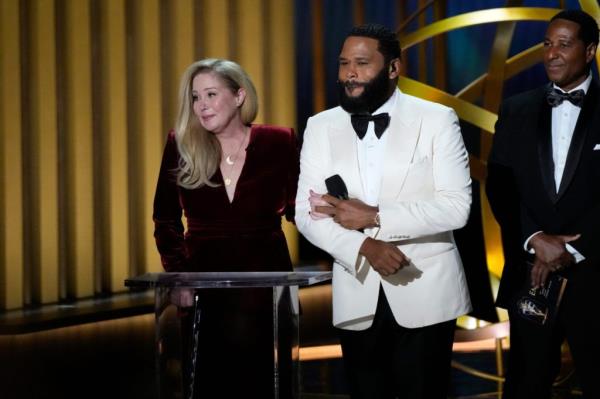 Christina Applegate and Anthony Anderson at the 75th Emmy Awards.