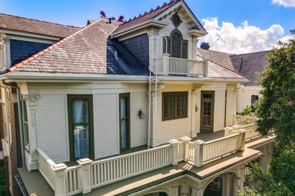 Balconies, terraces and covered porches grace the home