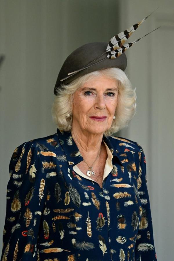 Queen Camilla at the annual Braemar Gathering in Scotland, wearing a hat