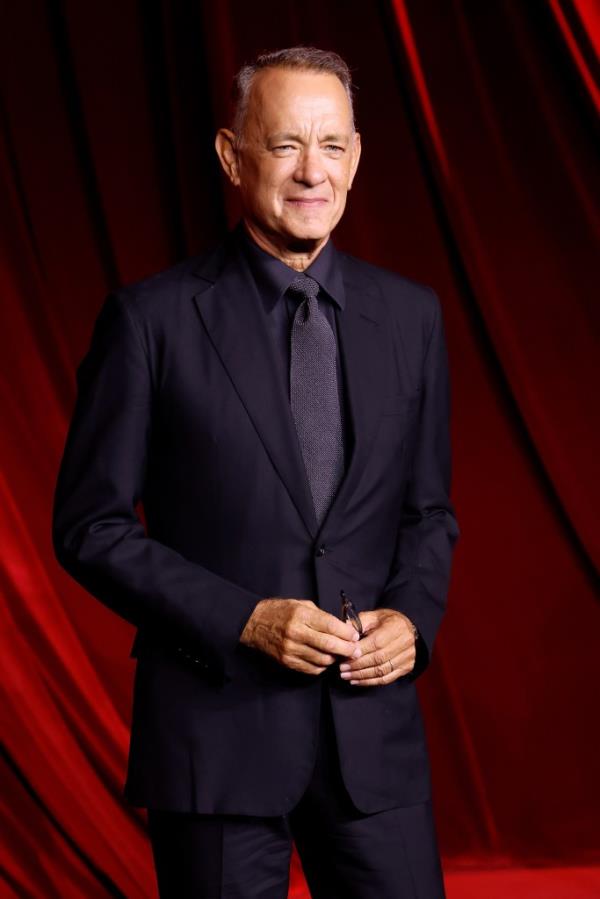 Tom Hanks voices Woody in 