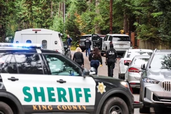 Police arrive on the scene of a shooting in Fall City, Washington