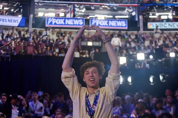 A young man cheers on the floor of the 2024 Democratic Natio<em></em>nal Co<em></em>nvention in Chicago, IL, Thursday, August 22, 2024.