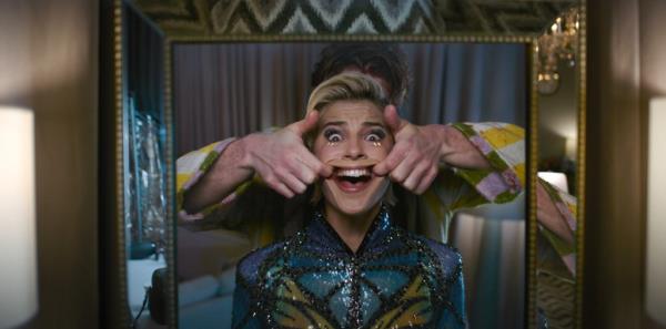 Naomi Scott making a face with her hands in a scene from the movie Smile 2, 2024.