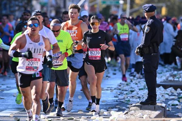 New York City Marathon runners race through Brooklyn, the second borough in the five-borough track.