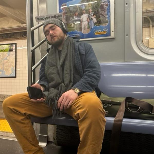 Colton Caulfield dressing up as an MTA ad.