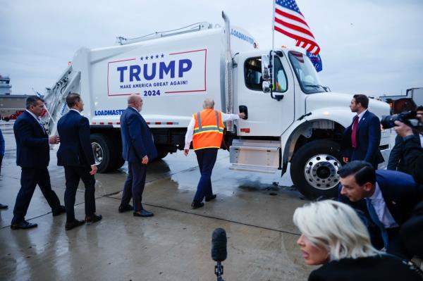 Trump prepares to hold a press co<em></em>nference from inside garbage track.