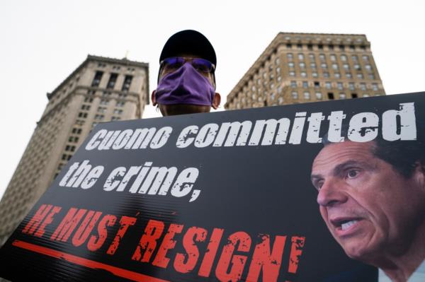 In this Thursday, March 25, 2021 file photo, demo<em></em>nstrators gather for a rally decrying New York Gov. Andrew Cuomo's handling of nursing homes during the COVID-19 outbreak, in New York.