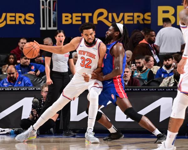 Karl-Anthony Towns #32 of the New York Knicks handles the ball during the game against the Detroit Pistons on November 1, 2024 at Little Caesars Arena