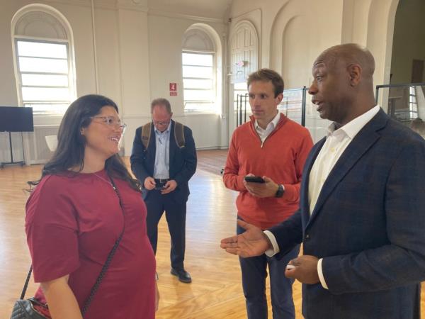 Private school teacher Amanda Greenberg (left) spoke to Scott following Thursday's event.