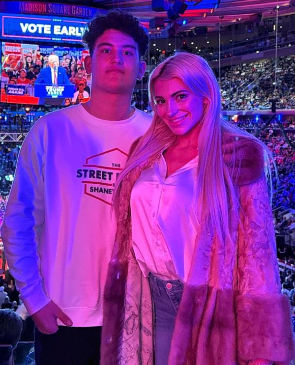 A young man and woman at the Trump rally at MSG.