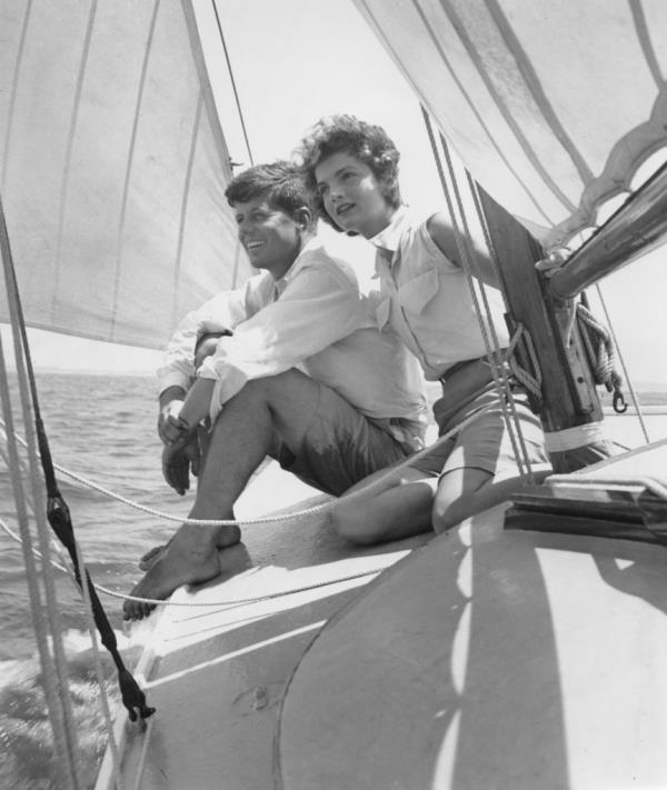 Senator John F. Kennedy and fiance Jacqueline Bouvier go sailing while on vacation at the Kennedy compound in June 1953 in Hyannis Port, Massachusetts. 