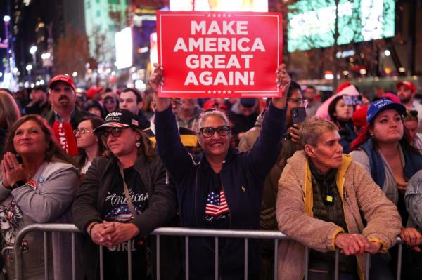 Trump supporters stand outside of Madison Square Garden.