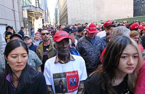 Trump supporters waiting patiently to get into MSG.