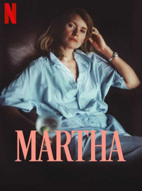 Martha Stewart sitting in a chair reflecting on her life and hardships for a docu<em></em>mentary.