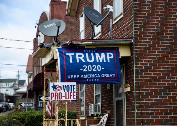 Political posters favoring U.S. presidential candidate President Do<em></em>nald Trump are attached to an overhang September 11, 2020 in Scranton, Pennsylvania.
