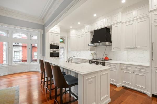 The open chef's kitchen, perfect for storing Brady's favorite chocolate avocado ice cream.