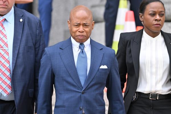 NYC Mayor Eric Adams attending a pre-trial hearing at Manhattan Criminal Courthouse on October 2, 2024, with Chirlane McCray