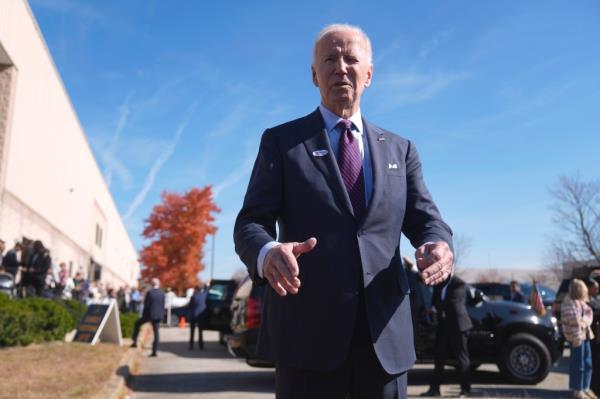 Biden waited more than a half-hour in line to vote in Wilmington, Del.
