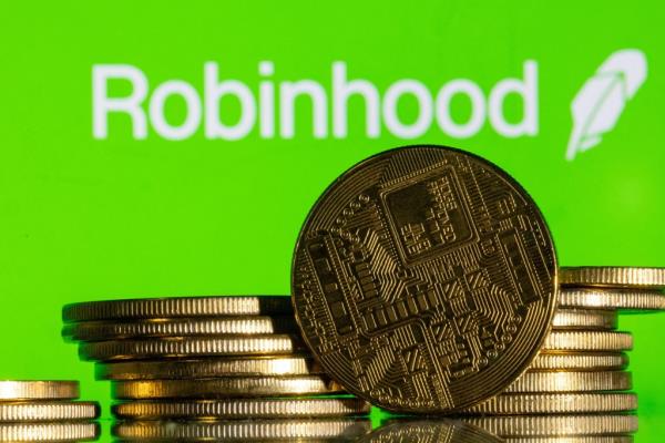 Robinhood logo and cryptocurrency coins.