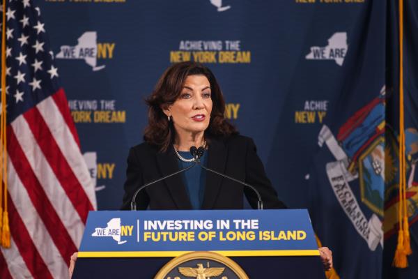 New York Governor Kathy Hochul speaking at a podium during a press event in Patchogue, New York.