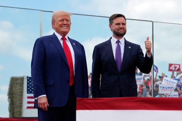 Tesla and SpaceX CEO Elon Musk, from left, Republican presidential nominee former President Do<em></em>nald Trump and Republican vice presidential nominee Sen. JD Vance, R-Ohio, attend a campaign event at the Butler Farm Show, Saturday, Oct. 5, 2024, in Butler, Pa.
