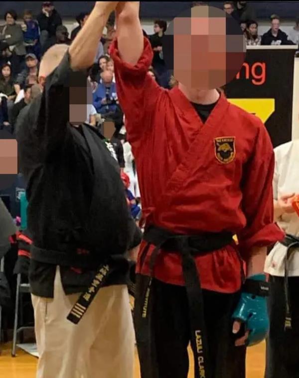 A trans athlete at a taw kwon do match.