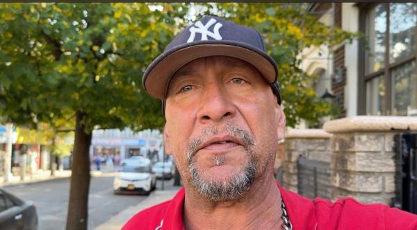 A local building super  named Freddy said he thwarted the stabbing by hitting the victim with a ba<em></em>seball bat.