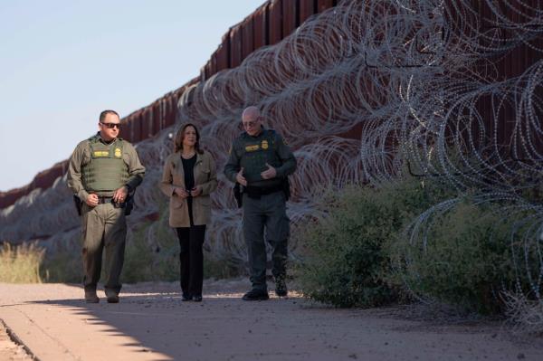 US Vice President Kamala Harris and Border Patrol Tucson Sector Chief John Modlin visiting the US-Mexico border in Douglas, Arizona on September 27, 2024.