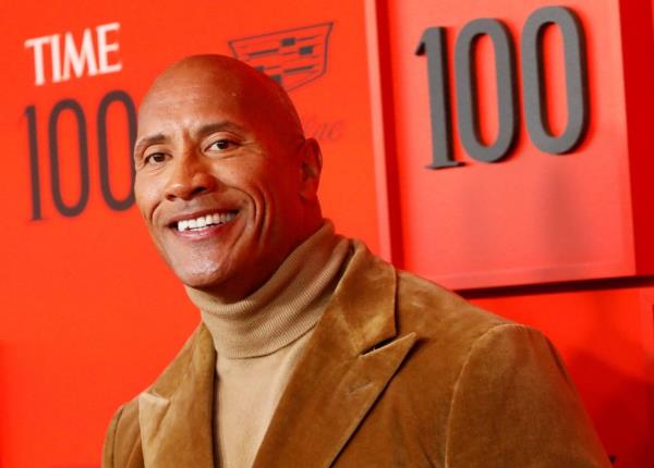Dwayne 'The Rock' Johnson smiling at the camera during the Time 100 Gala in New York, celebrating Time's most influential people of the world.