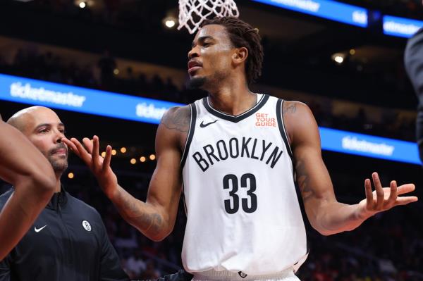  Nic Claxton #33 of the Brooklyn Nets reacts during the fourth quarter of the game against the Atlanta Hawks at State Farm Arena on October 23, 2024 in Atlanta, Georgia.