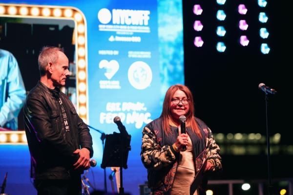 Randy Fisher and Rachael Ray speak at the  Food Network New York City Wine and Food Festival on October 18