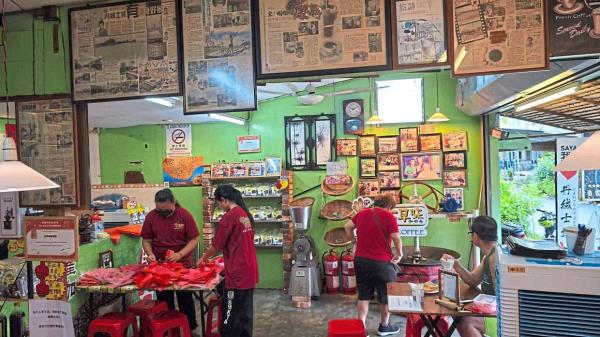 Kwo Zha B Coffee’s interior housing plenty of mementos from famous patrons.