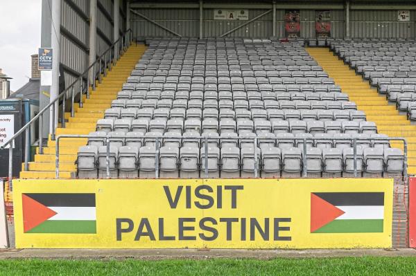 Murals supporting various causes forming the stadium’s backdrop. The approach is not universally popular. — ?2024 The New York Times Company
