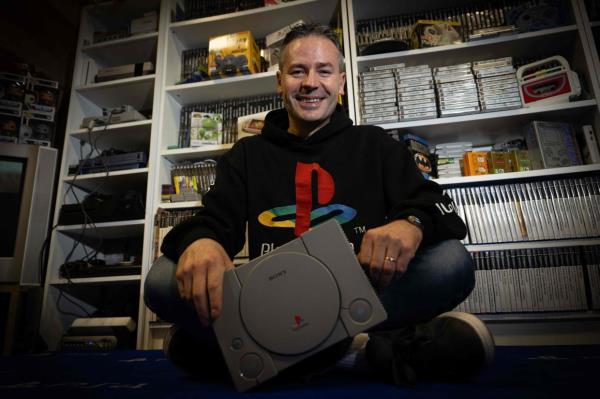 French PlayStation collector Cyril, poses with a PlayStation 1 video game console, at his home in Vraiville, on Nov 20, 2024. Sony is set to celebrate 30 years since it launched the PlayStation console, the little grey box that catapulted the firm into the gaming big league. — AFP