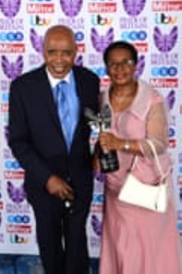 Paul Stephenson, with his wife, Joyce, receiving a Lifetime Achievement award at The Pride of Britain awards 2017.
