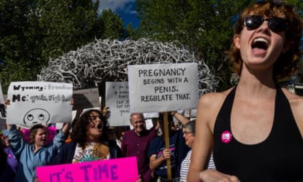 Abortion rights protesters chant slogans during a gathering to protest against the supreme court’s decision in the Dobbs v Jackson Women’s Health case on 24 June 2022 in Jackson Hole, Wyoming.