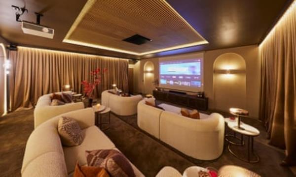 Media room with beige interior